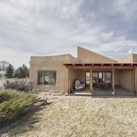 Buy this 5 bed house on 1 Alegro Ln in El Prado, New Mexico