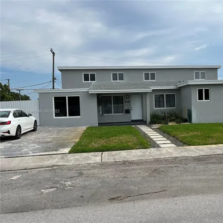 Buy this 8 bed house on 3021 Northwest 186th Terrace in Carol City, Miami Gardens