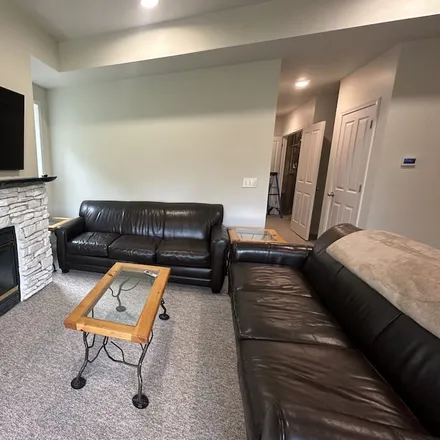 Rent this 2 bed condo on Kearney Township in MI, 49615