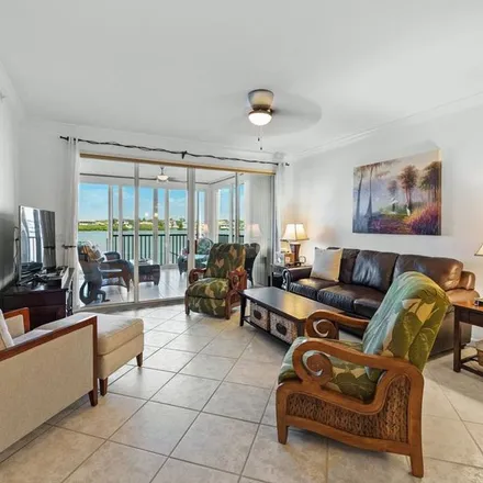 Rent this 2 bed apartment on 1299 Dolphin Bay Way in Siesta Key, FL 34242