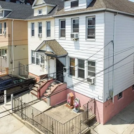 Buy this 5 bed house on 39-64 65th Pl in Woodside, New York