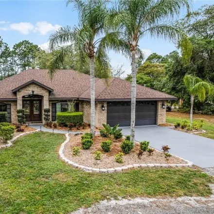 Buy this 4 bed house on 2695 Kingsdale Drive in Deltona, FL 32738