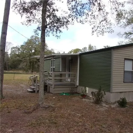 Rent this studio apartment on 10427 Southwest 151st Place in Marion County, FL 34432