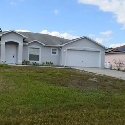 Rent this 3 bed house on 3014 Telesca Road Southeast in Palm Bay, FL 32909