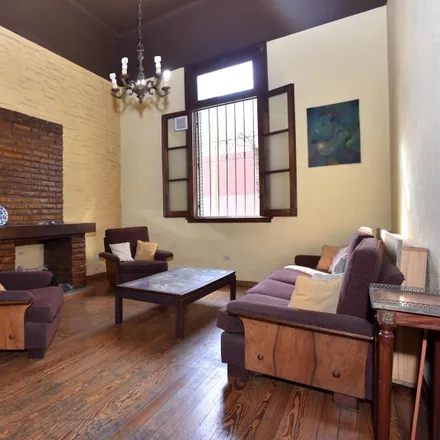 Buy this 3 bed house on Jacarandá 1367 in Floresta, C1407 FAI Buenos Aires