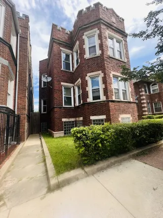 Rent this 3 bed house on 1734 West Garfield Boulevard in Chicago, IL 60636