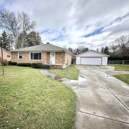 Buy this 3 bed house on 1834 Coolidge Avenue in Saginaw Charter Township, MI 48638