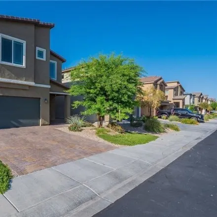 Buy this 5 bed house on Floating Fern Avenue in North Las Vegas, NV 89085