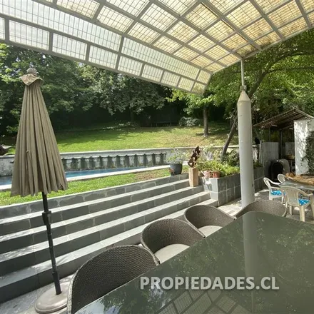 Buy this 4 bed house on Calle El Amancay 199 in 771 0053 Provincia de Santiago, Chile