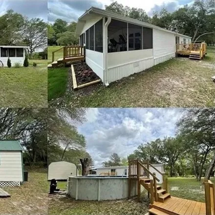 Buy this studio apartment on 6426 Southeast 220 Avenue in Levy County, FL 32668