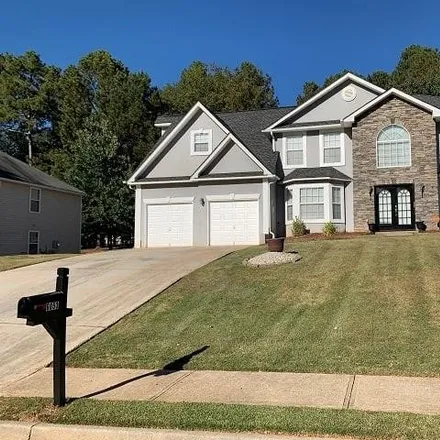 Buy this 5 bed house on 6061 Pavestone Drive in Cobb County, GA 30127