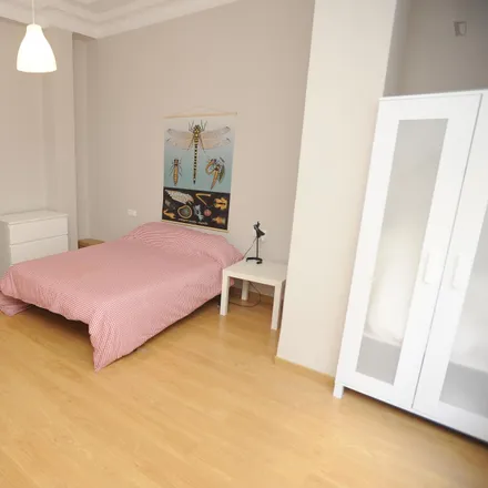 Rent this 8 bed room on Carrer de les Garrigues in 46001 Valencia, Spain