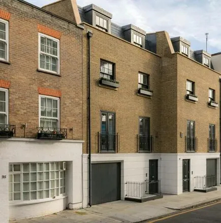 Buy this 5 bed townhouse on 37 Abingdon Road in London, W8 6AH