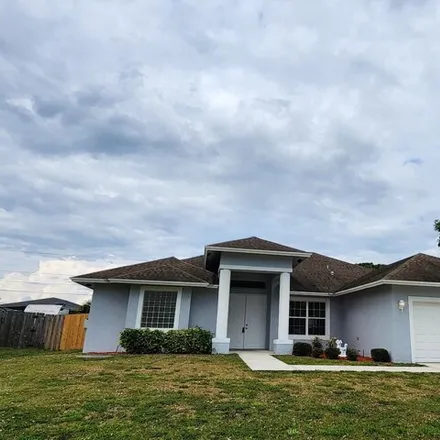 Buy this 4 bed house on 455 Southwest Laconic Avenue in Port Saint Lucie, FL 34953