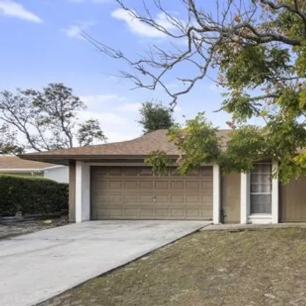 Buy this 4 bed house on 6012 Wedgewood Circle in Orange County, FL 32808
