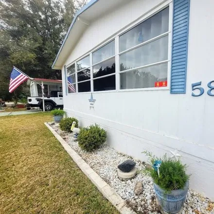 Buy this studio apartment on 2934 3rd Street in Lady Lake, FL 32158