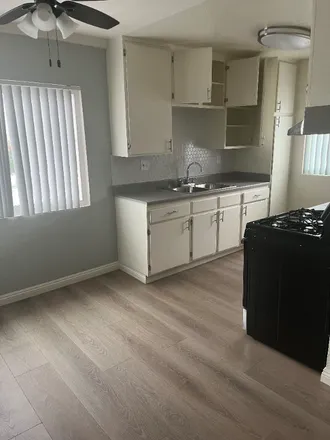 Rent this 2 bed apartment on 8014 Woodman Avenue