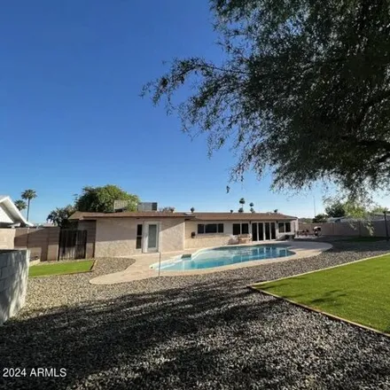 Rent this 4 bed house on 2236 East Contessa Circle in Mesa, AZ 85213
