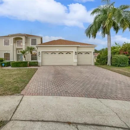 Buy this 5 bed house on 8655 Dover Oaks Ct in Orlando, Florida