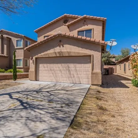 Buy this 4 bed house on 7507 Majestic Palm Lane in Tucson, AZ 85756