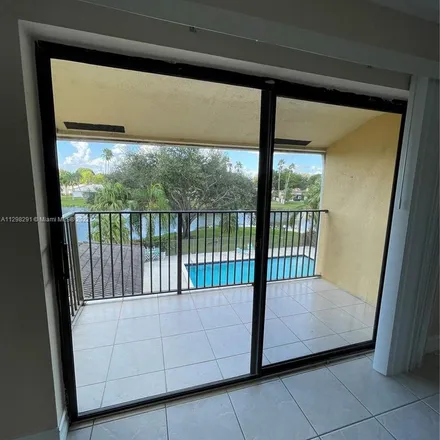 Rent this 2 bed apartment on 11453 Northwest 39th Court in Coral Springs, FL 33065