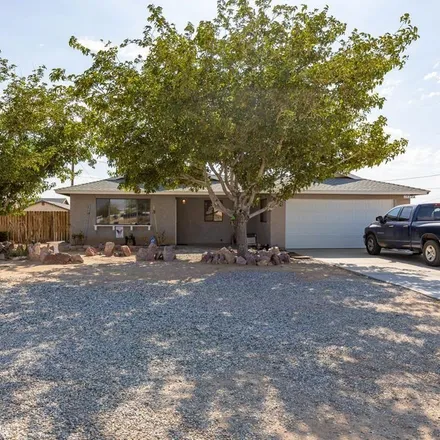 Rent this 3 bed house on 19724 87th Street in California City, CA 93505