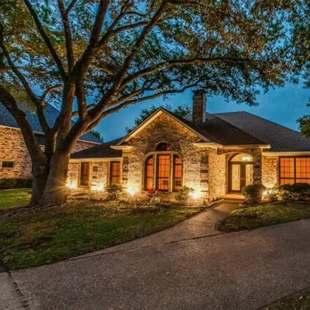 Buy this 4 bed house on 2601 Oak Point Drive in Garland, TX 75044