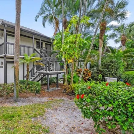 Buy this 2 bed condo on Polo Road East in Wellington, FL 33414