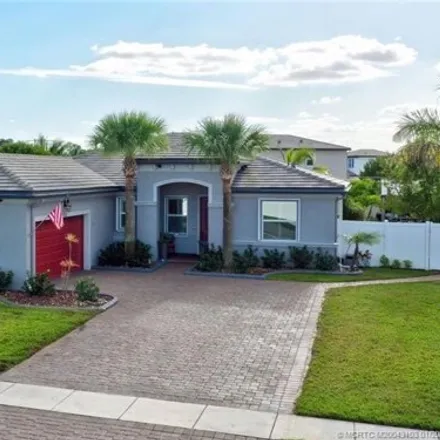 Buy this 3 bed house on 7719 Southwest Greenspring Street in Port Saint Lucie, FL 34987