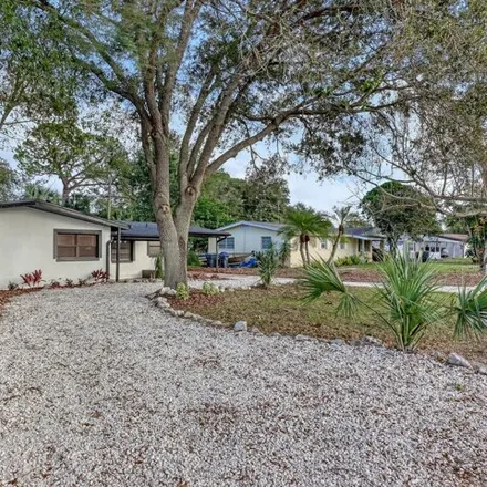 Buy this 4 bed house on 4447 Carlysle Avenue in Titusville, FL 32780