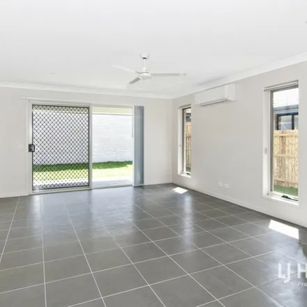 Rent this 4 bed apartment on Morion Street in Yarrabilba QLD, Australia