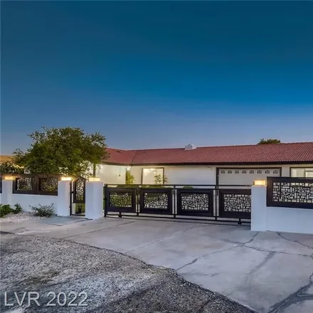 Buy this 5 bed house on 6975 Darby Avenue in Spring Valley, NV 89117