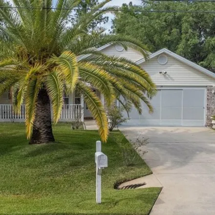 Buy this 3 bed house on 39 Rockefeller Drive in Palm Coast, FL 32164