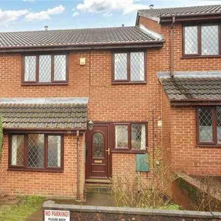 Buy this 3 bed townhouse on Ireland Wood Primary School in Raynel Gardens, Leeds