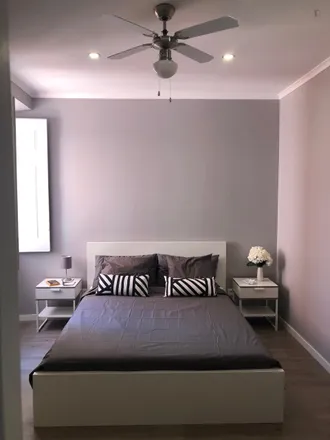 Rent this 8 bed room on Avenida Luís Bívar 7 in 1050-228 Lisbon, Portugal