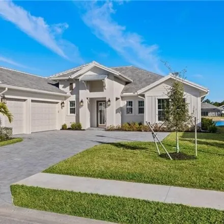 Buy this 4 bed house on 14233 Laguna Springs Ln in Naples, Florida