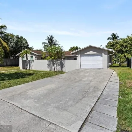 Buy this 3 bed house on 4519 Northwest 84th Avenue in Lauderhill, FL 33351