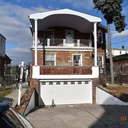 Buy this 6 bed house on 149-07 85th Road in New York, NY 11435
