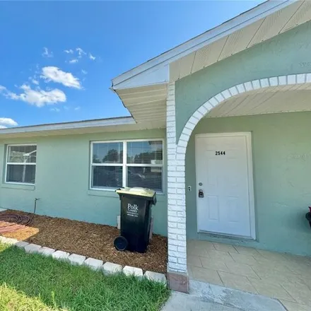 Rent this 2 bed house on 2542 Elm Avenue in Polk County, FL 33898