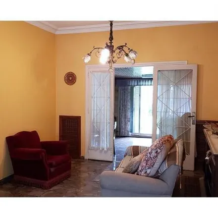 Buy this 4 bed house on 836 - Las Malvinas 7216 in Partido de Tres de Febrero, B1683 AEV Martín Coronado