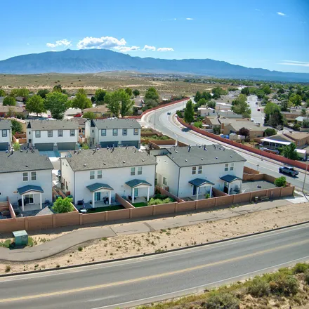 Buy this 3 bed townhouse on Estrella Court Northeast in Rio Rancho, NM 87174