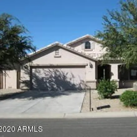 Rent this 4 bed house on 1668 East Vernoa Street in San Tan Valley, AZ 85140