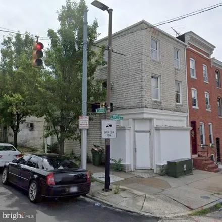 Buy this 8 bed house on 101 South Poppleton Street in Baltimore, MD 21201