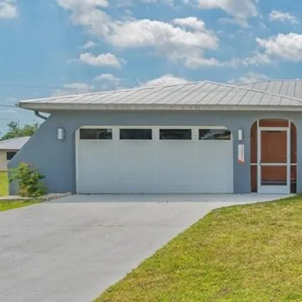 Buy this 3 bed house on 1275 Zinnea Street in Port Charlotte, FL 33952