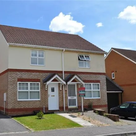 Rent this 2 bed duplex on Dove Close play area in Dove Close, Cullompton