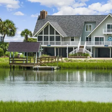 Buy this 6 bed house on 670 Springs Avenue in Pawleys Island, Georgetown County