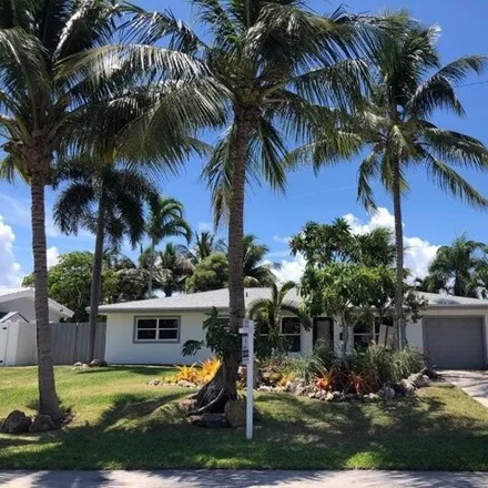 Rent this 3 bed house on 434 Northeast 33rd Street in Lake Rogers Isle, Boca Raton