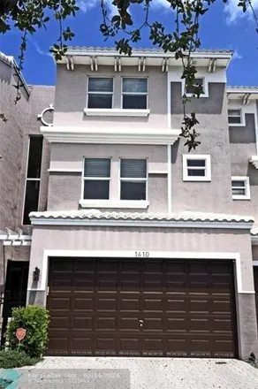 Buy this 3 bed townhouse on 1434 Northeast 26th Avenue in Bay Harbor, Fort Lauderdale