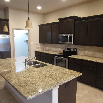 Rent this 4 bed apartment on 776 Davey Crockett in Rockwall, TX 75087