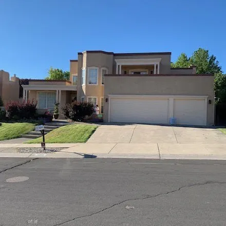 Buy this 4 bed house on 12357 San Victorio Avenue Northeast in Peppertree/Royal Oak, Albuquerque